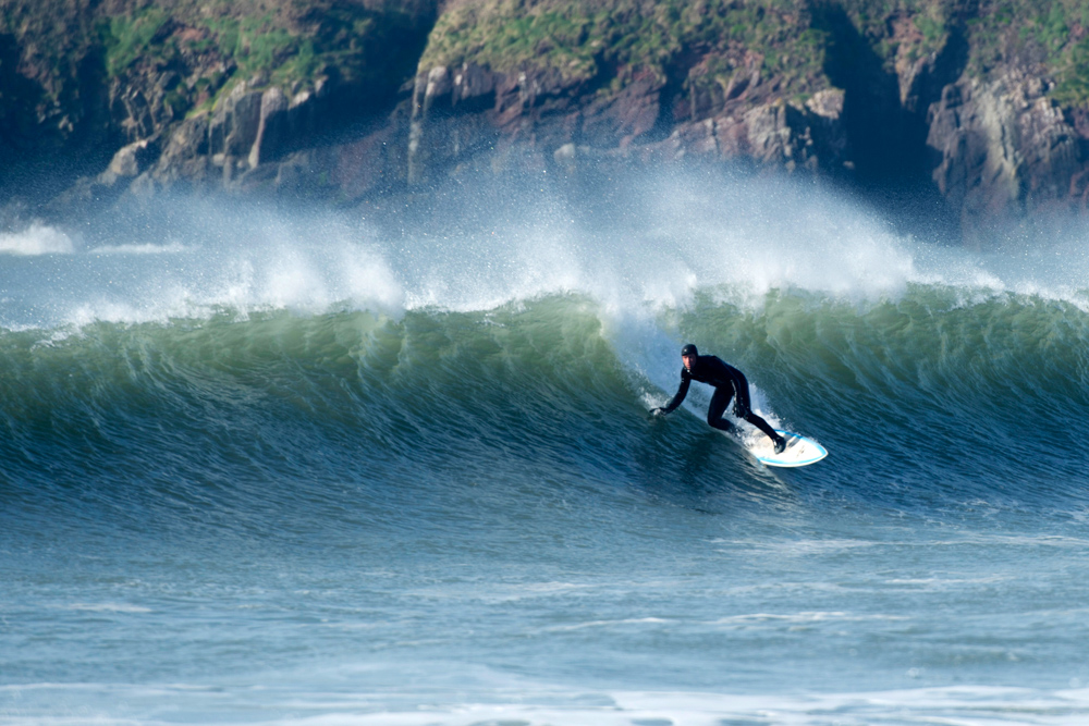 surfer on offshore waves