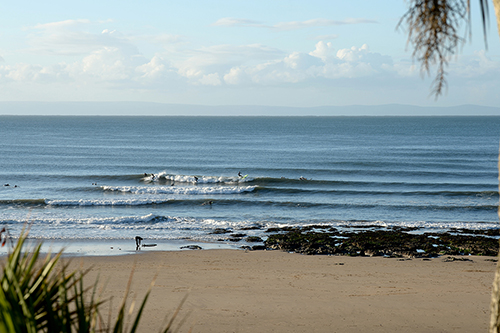 overview of bay and surfers